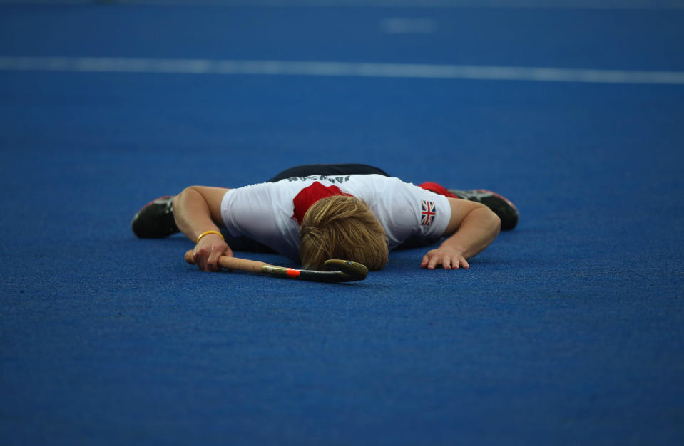 LONDON, ENGLAND - JULY 30: Ashley Jackson of Great Britain lays on the floor after missing a shot on goal during the Men's Hockey Match between Great Britain and Argentina on Day 3 of the London 2012 Olympic Games at the Riverbank Arena on July 30, 2012 in London, England. (Photo by Daniel Berehulak/Getty Images)