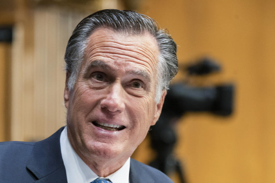 FILE - Sen. Mitt Romney, R-Utah, questions witnesses during a Senate Health, Education, Labor, and Pensions Committee hearing on June 16, 2022, in Washington. GOP senators are accusing the Biden administration of using $39 billion meant to build computer chip factories to further “woke” ideas such as requiring some recipients to offer child care and encouraging the use of union labor. “What President Biden is doing by jamming woke and green agenda items into legislation we pass is making it harder for him to ever get legislation passed again,” said Romney, who voted for the law. (AP Photo/Manuel Balce Ceneta, File)