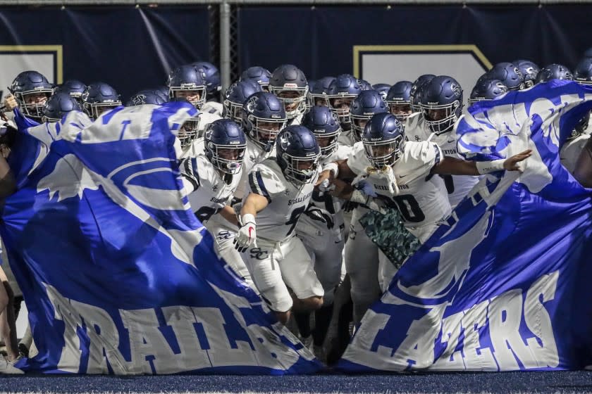 Bellflower, CA, Saturday March 13, 2021 - Sierra Canyon players enter the field before taking on St. John Bosco at Panish Family Stadium. (Robert Gauthier/Los Angeles Times)