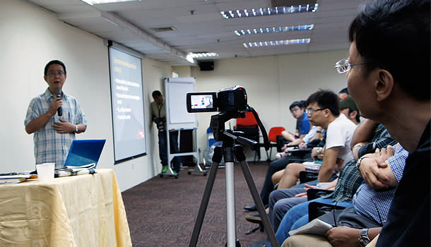 Yawning Bread founder Alex Au says the President's office is political, although non-partisan. (Yahoo! photo/Alicia Wong)