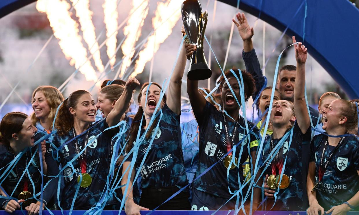 <span>Sydney FC lift with the trophy at the conclusion of a momentous 2023-24 ALW season.</span><span>Photograph: Daniel Pockett/AAP</span>