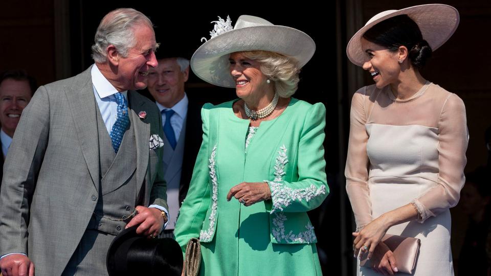 Prince Charles, Prince of Wales and Camilla, Duchess of Cornwall with Meghan, Duchess of Sussex during The Prince of Wales' 70th Birthday Patronage Celebration held at Buckingham Palace on May 22, 2018 in London