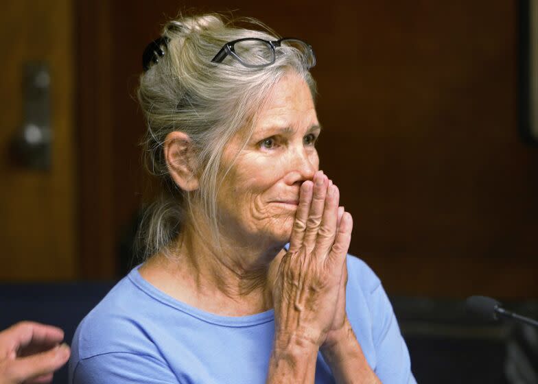 FILE - In this Sept. 6, 2017, file photo, Leslie Van Houten reacts after hearing she is eligible for parole during a hearing at the California Institution for Women in Corona, Calif. A California panel has recommended parole for Charles Manson follower Van Houten, who has spent nearly five decades in prison. The recommendation was made Thursday, July 23, 2020, although Gov. Gavin Newsom could decide to deny it. (Stan Lim/Los Angeles Daily News via AP, Pool, File)