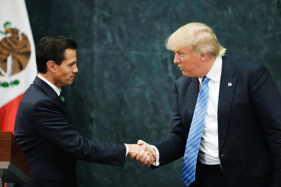 U.S. Republican presidential nominee Donald Trump and Mexico's President Enrique Pena Nieto shake hands at a press conference at the Los Pinos residence in Mexico City, Mexico, August 31, 2016.