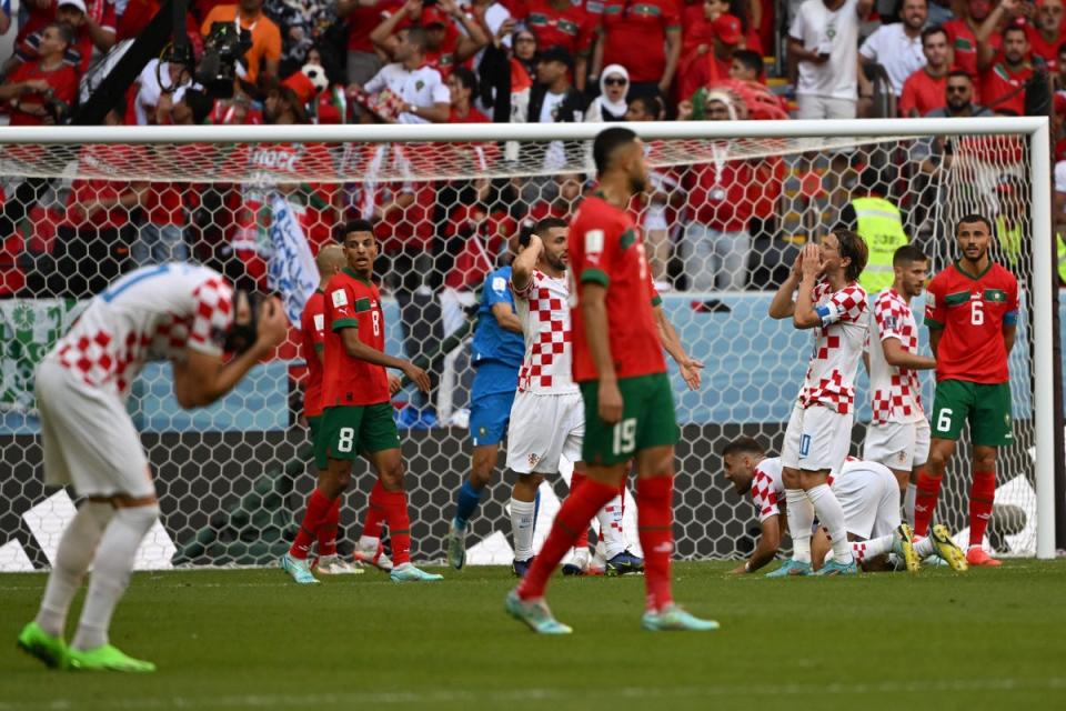 Luka Modric reacts to a missed chance (AFP via Getty Images)