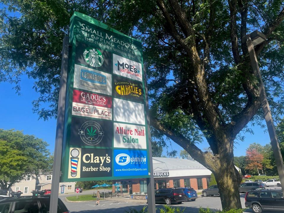 A blank space where Affordable Dentures & Implants used to be on the sign for the Small Meadows Shopping Center in South Burlington, as seen on Sept. 20, 2023.