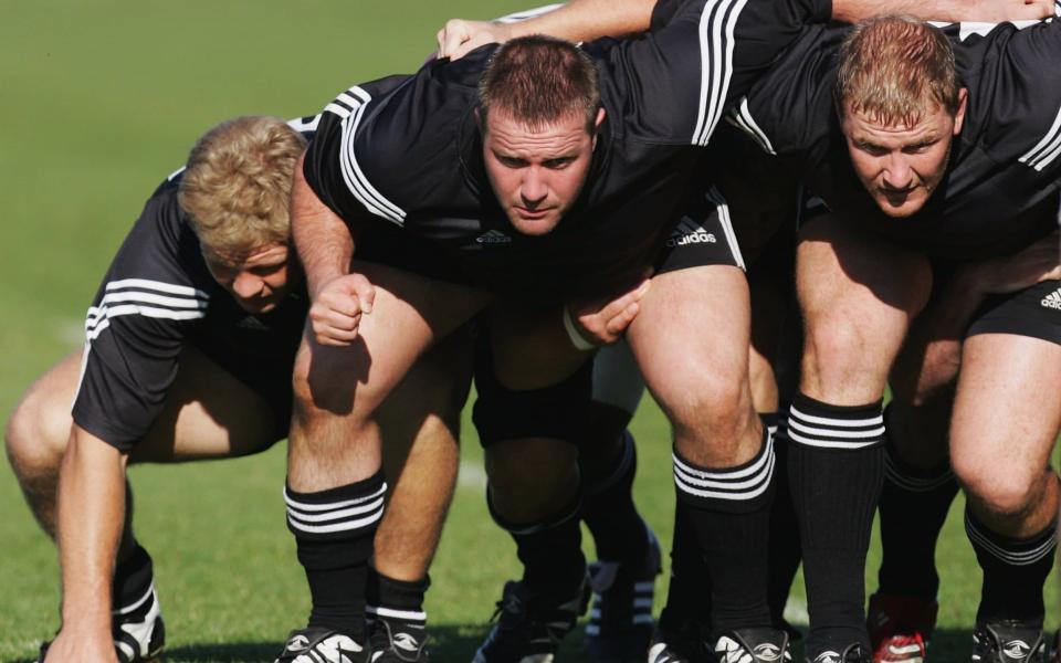 Daniel Braid (L), Campbell Johnstone and Derren Witcombe (R) pack down in the scrum during a Junior All Blacks training session held at North Harbour Stadum - Sandra Mu/Getty Images