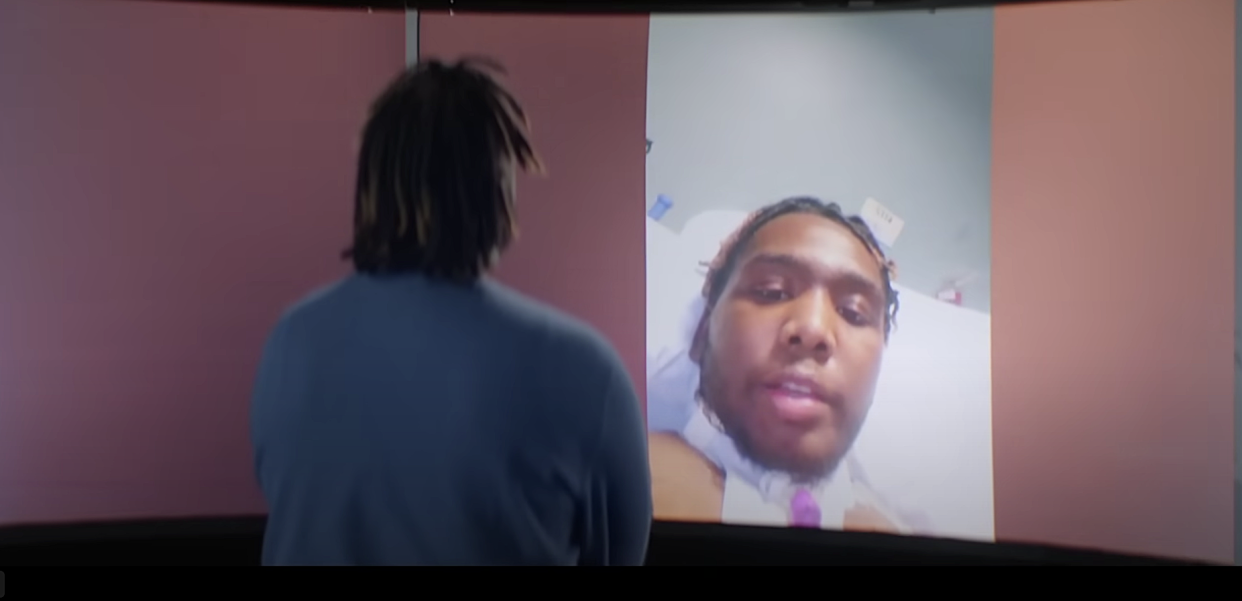 'American Idol' contestant Elijah McCormick watches his post-accident hospital footage from 2019 while waiting to audition. (Photo: ABC)