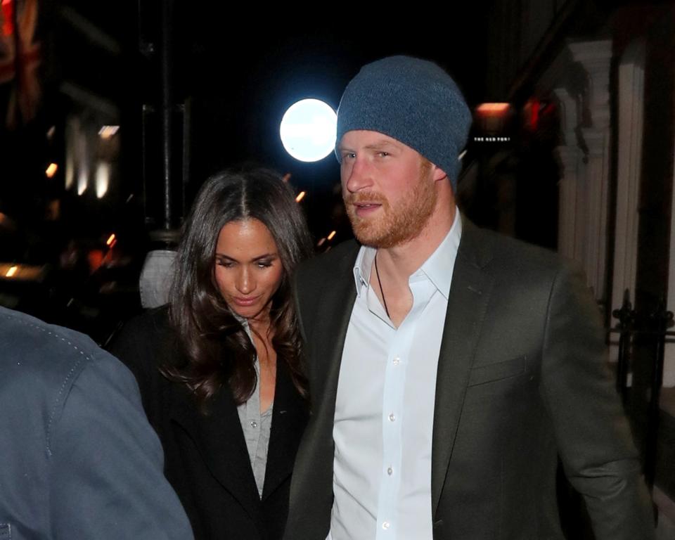 <p>The couple was officially photographed for the first time in February, after having a dinner date at London’s Soho House. Harry held Markle’s hand as the duo was swarmed by waiting paparazzi.<br>(Photo: FameFlynet) </p>