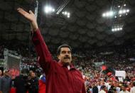 Venezuela's President Nicolas Maduro waves as he attends a gathering in support of him and his proposal for the National Constituent Assembly in Caracas, Venezuela June 27, 2017. Miraflores Palace/Handout via REUTERS