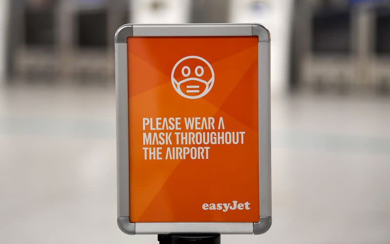 An informational sign is seen at Gatwick Airport, in Gatwick