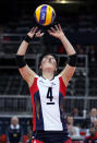 LONDON, ENGLAND - JULY 28: Sa-Nee Kim #4 of Korea sets the ball in the second set against United States during Women's Volleyball on Day 1 of the London 2012 Olympic Games at Earls Court on July 28, 2012 in London, England. (Photo by Elsa/Getty Images)