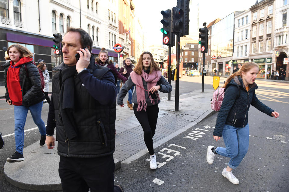 People running away from Borough Market in London after police to them to leave the area.