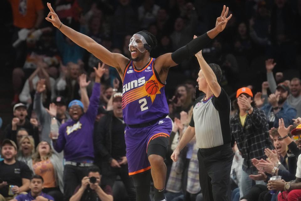 Feb 16, 2023; Phoenix, Arizona, USA; Phoenix Suns guard 	Josh Okogie (2) celebrates his 3-pointer against the Los Angeles Clippers at Footprint Center. 