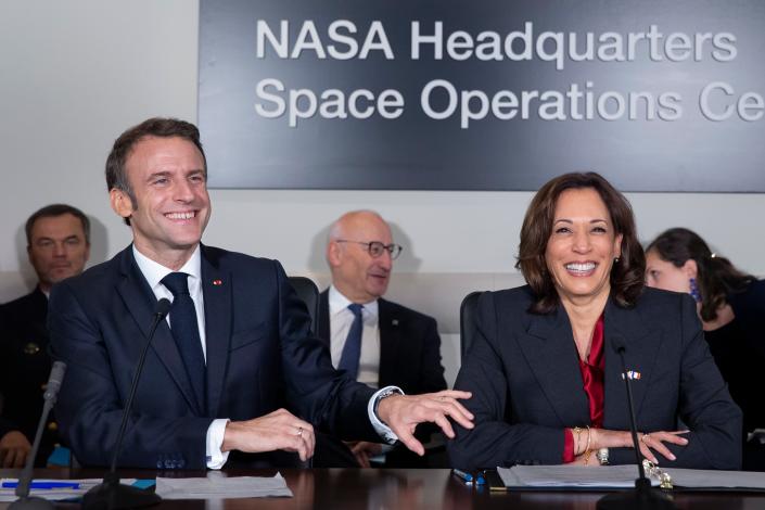 France’s president Emmanuel Macron meets with US vice president Kamala Harris at the National Aeronautics and Space Administration headquarters, to highlight space cooperation between France and the US, in Washington, DC, 30 November 2022 (EPA)