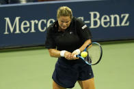 Kim Clijsters, of Belgium, returns a shot to Ekaterina Alexandrova, of Russia, during the first round of the U.S. Open tennis championships, Tuesday, Sept. 1, 2020, in New York. (AP Photo/Frank Franklin II)