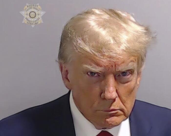 This booking photo provided by Fulton County Sheriff's Office, shows former President Donald Trump on Thursday, Aug. 24, 2023