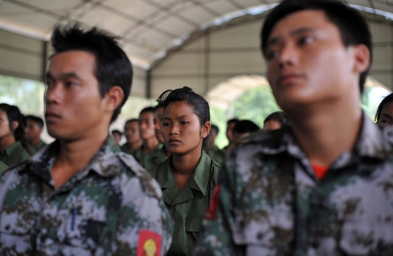 Trainees are seen attending a course at the Kachin Independence Army (KIA) military training school in Laiza, a town in Myanmar's northern Kachin state and home to the ethnic Kachin rebels' headquarters, on September 21, 2012