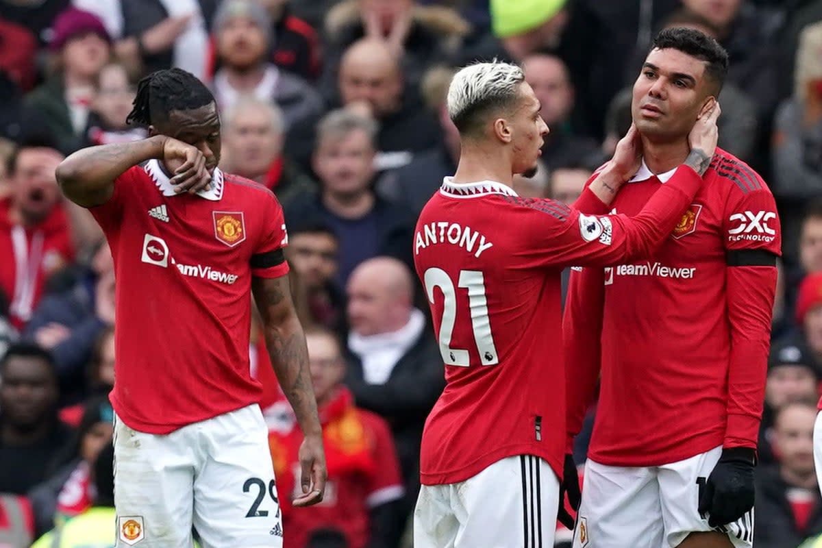 Casemiro, right, is consoled by Antony after being sent off against Southampton (Martin Rickett/PA) (PA Wire)