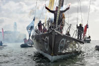 <p>French skipper Romain Attanasio, placing 15th in the Vendee Globe around-the-world solo sailing race, celebrates aboard his Imoca 60 monohull “Famille Mary-Etamine du Lys” as he arrives in Les Sables-d’Olonne, western France, Feb. 24, 2017. (Photo: Jean-Sebastien Evrard/AFP/Getty Images) </p>