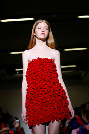 A model presents a creation during the Annakiki show at Milan Fashion Week in Milan, Italy February 20, 2019. REUTERS/Alessandro Garofalo