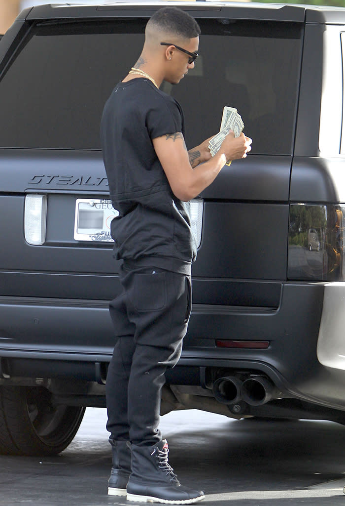 Lil Twist Showing Off His Dollars At A Gas Station