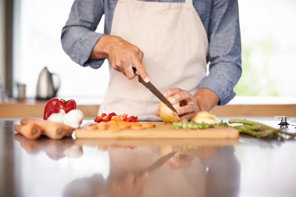 Cropped shot of a man chopping up some vegtableshttp://195.154.178.81/DATA/i_collage/pi/shoots/783527.jpg