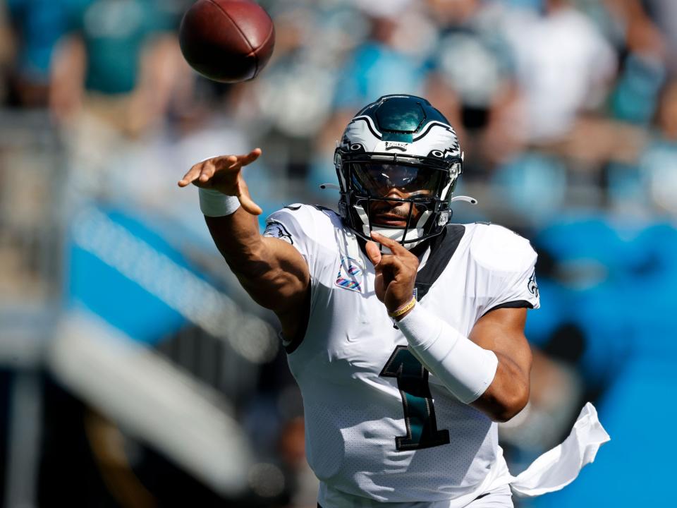 Jalen Hurts makes a throw against the Carolina Panthers.