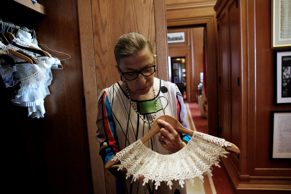 U.S. Supreme Court Justice Ginsburg shows robes in her chambers at the Supreme Court building in Washington (Jonathan Ernst / Reuters)