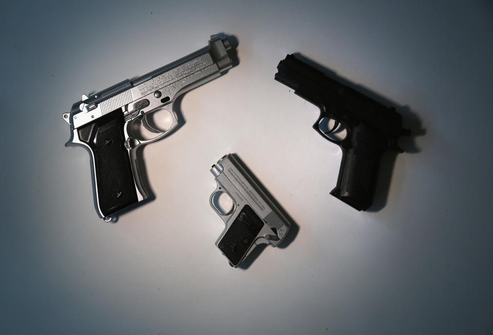 Toy guns are displayed after being confiscated at airport security checkpoints at the JFK International Airport on November 18, 2014 in New York City.