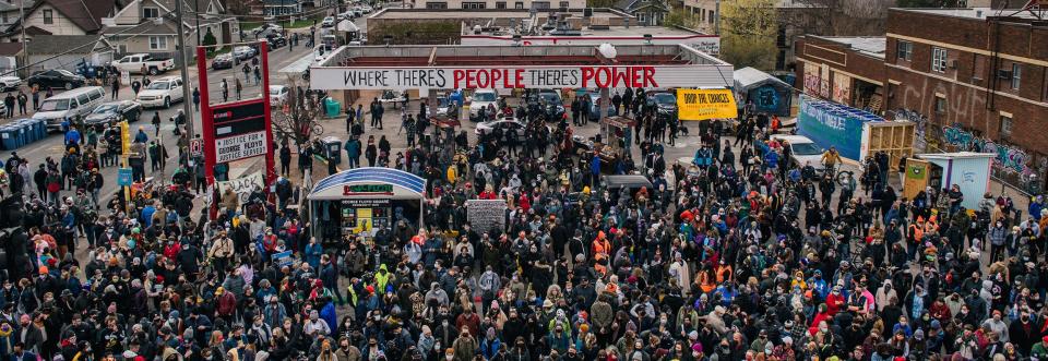 People gather at the intersection of 38th Street and Chicago Avenue to celebrate the guilty verdict in the Derek Chauvin trial on April 20, 2021, in Minneapolis. The former Minneapolis police officer was found guilty on all three charges he faced in the death of George Floyd.