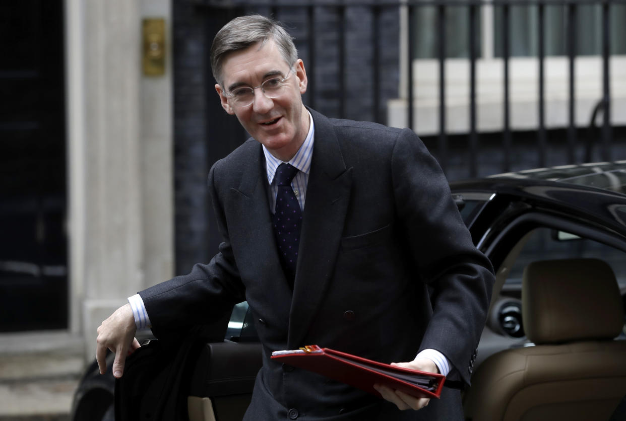 Britain's Leader of the House of Commons Jacob Rees-Mogg arrives for a Cabinet meeting at 10 Downing Street in London, Wednesday, Oct. 16, 2019. The European Union's chief Brexit negotiator says talks between the EU and Britain on the country's departure from the bloc are continuing after running through the night but that obstacles remain. (AP Photo/Kirsty Wigglesworth)