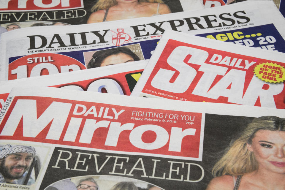 LONDON, ENGLAND - FEBRUARY 09:  Issues of the Daily Mirror, Daily Star and Daily Express are seen on February 9, 2018 in London, England.  The Trinity Mirror media group has agreed to pay £126.7m for Northern & Shell, the media company which publishes the Express and Star newspapers, as well as magazines OK!, New! and Star.  (Photo Illustration by Leon Neal/Getty Images)