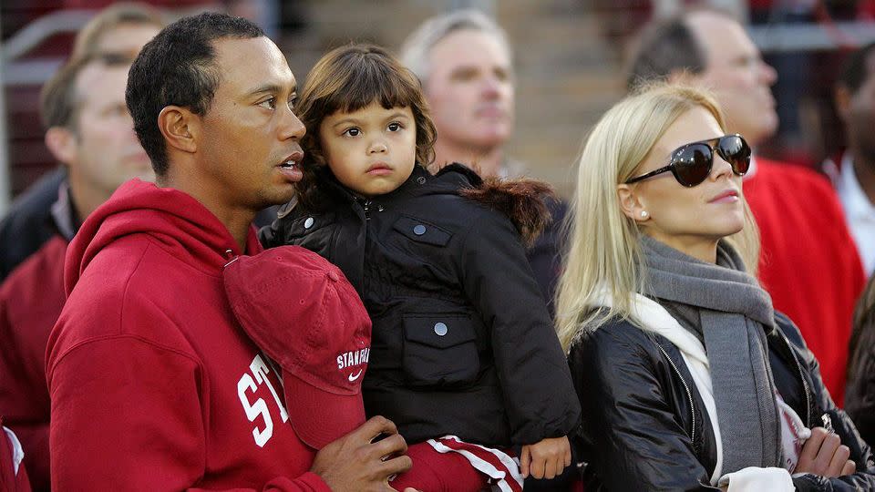 Woods with former wife Elin Nordegren and one of their children. Pic: Getty