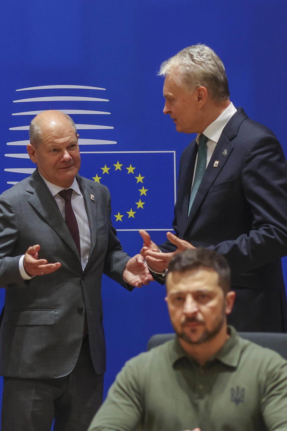 From left, Germany's Chancellor Olaf Scholz, Lithuania's President Gitanas Nauseda and Ukraine's President Volodymyr Zelenskyy during a round table meeting at an EU summit in Brussels, Thursday, June 27, 2024. European Union leaders are expected on Thursday to discuss the next EU top jobs, as well as the situation in the Middle East and Ukraine, security and defence and EU competitiveness. (Olivier Hoslet, Pool Photo via AP)