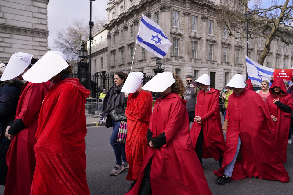 Protestors demonstrate during a visit of Israeli Prime Minister Benjamin Netanyahu to London, Friday, March 24, 2023.(AP Photo/Alberto Pezzali)