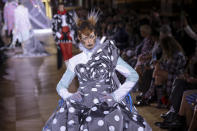 A model wears a creation for the Thom Browne ready-to-wear Spring/Summer 2023 fashion collection presented Monday, Oct. 3, 2022 in Paris. (Photo by Vianney Le Caer/Invision/AP)