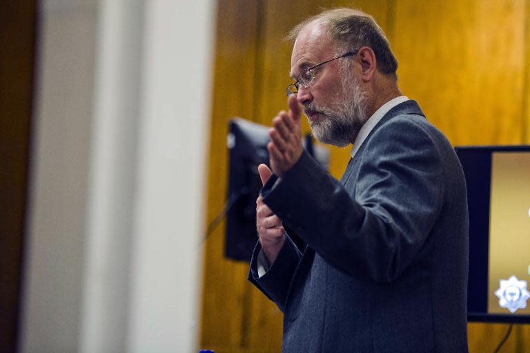 Forensic geologist Roger Dixon testifies during the murder trial of paralympian Oscar Pistorius on April 17, 2014 in the North Gauteng High Court in Pretoria