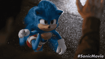 Sonic the Hedgehog character giving a high five in a scene from #SonicMovie