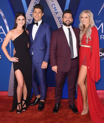 <p>Michael Loccisano/Getty</p> Abby Smyers, Dan Smyers and Shay Mooney of Dan + Shay, and Hannah Billingsley attend the 51st annual CMA Awards in November 2017 in Nashville, Tennessee