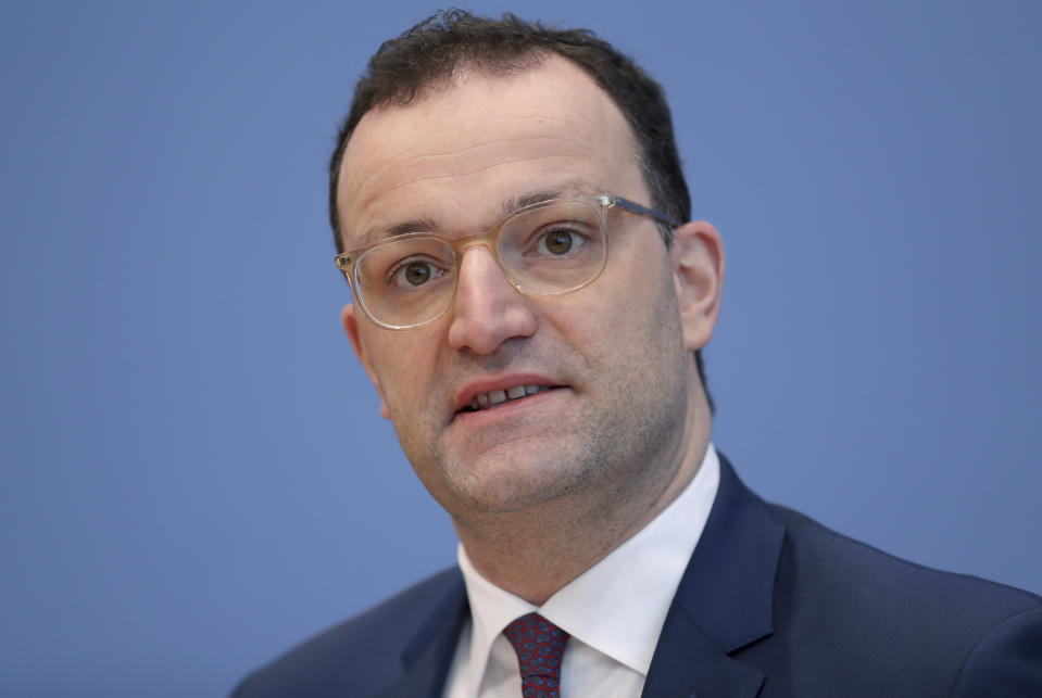 German Health Minister Jens Spahn addresses the media during a press conference in Berlin, Germany, Wednesday, Dec. 30, 2020 on the new coronavirus, COVID-19, situation and the vaccination campaign in Germany. German authorities have reported more than 1,000 coronavirus-related deaths in one day for the first time since the pandemic began. The national disease control center, the Robert Koch Institute, said Wednesday that 1,129 more deaths were reported over the past 24 hours. (AP Photo/Michael Sohn, pool)