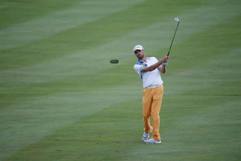 Troy Merritt hits his second shot on the 14th hole during the third round of the Quicken Loans National at the Robert Trent Jones Golf Club on August 1, 2015 in Gainesville, Virginia