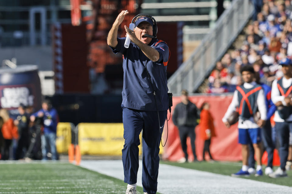 New England Patriots head coach Bill Belichick calls for a time out during the second half of an NFL football game against the Detroit Lions, Sunday, Oct. 9, 2022, in Foxborough, Mass. (AP Photo/Michael Dwyer)