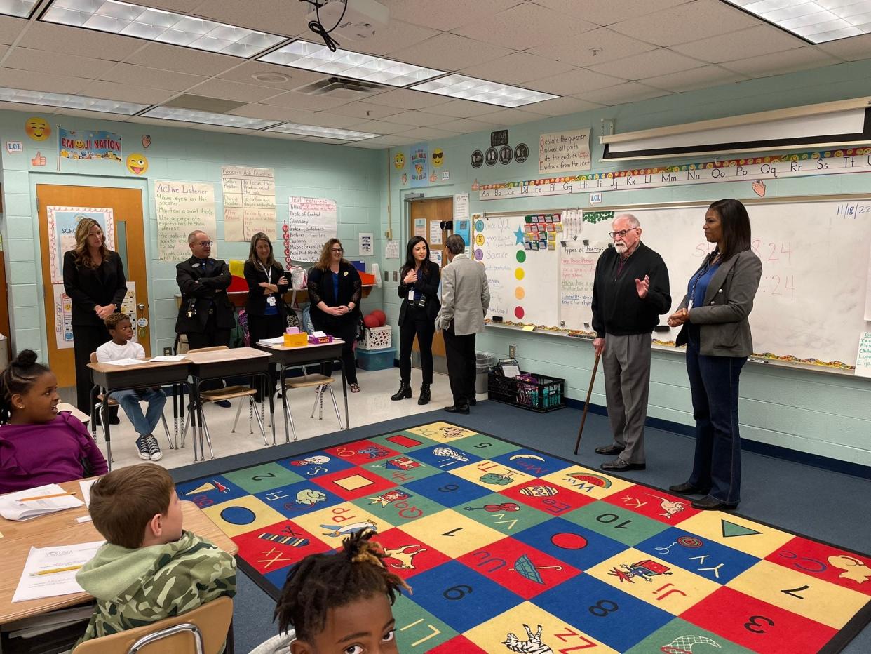 Local entrepreneur and philanthropist L. Gale Lemerand and Principal Karen Troutman visit a classroom at Palm Terrace Elementary in November, when Lemerand donated $100,000 to the Daytona Beach school.