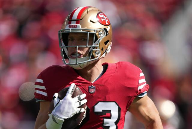 San Francisco 49ers running back Christian McCaffrey (23) walks on