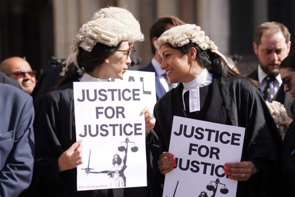 Criminal defence barristers outside the Royal Courts of Justice in London during a previous strike (Kirsty O’Connor/PA) (PA Wire)