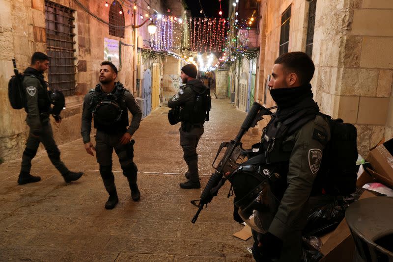 Israeli police stand guard near a security incident scene, in Jerusalem's Old City