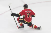 Calgary Flames' Mikael Backlund (11) celebrates a goal against the Winnipeg Jets during the second period of an NHL hockey playoff game Saturday, Aug. 1, 2020 in Edmonton, Alberta. (Jason Franson/The Canadian Press via AP)