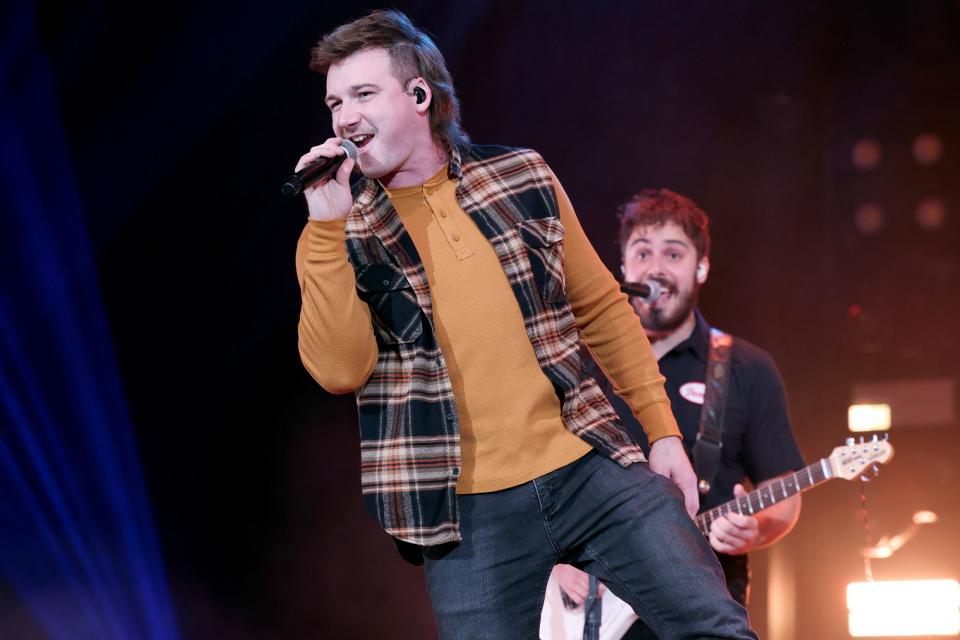 <p>Morgan Wallen performs at the Ryman Auditorium on Tuesday in Nashville.</p>