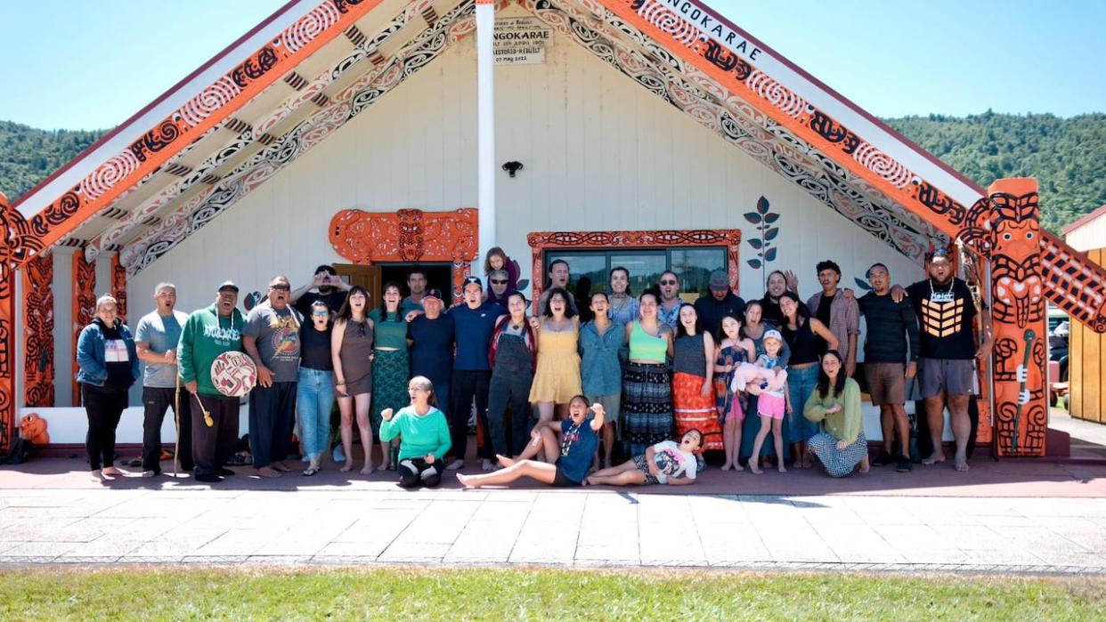 The group of Yukoners at Tūhoe marae — a meeting house — in Ruatoki, New Zealand, last month. About 25 Yukoners took part in the 3-week cultural exchange. (Submitted by Jocelyn Joe-Strack - image credit)